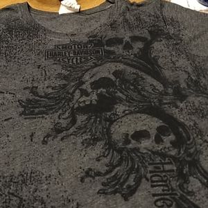 T shirt says Xl but fits more like med or large